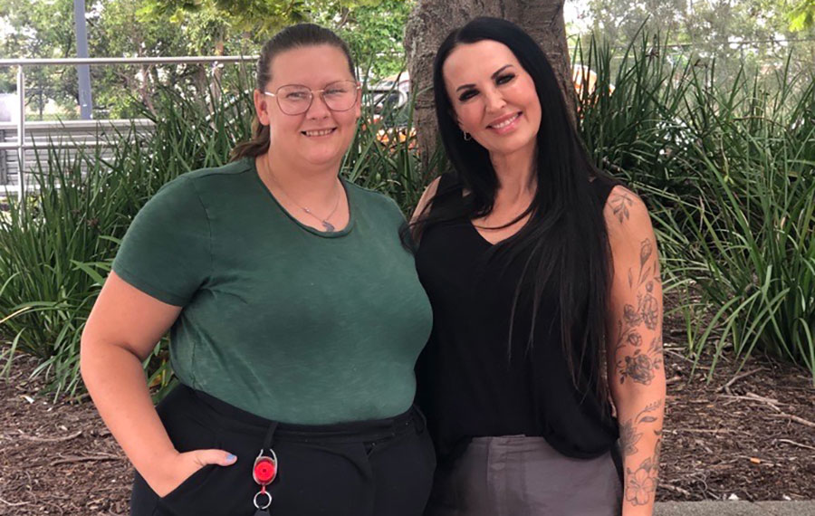 Cheyenne and Kim outside the Logan Housing Service Centre